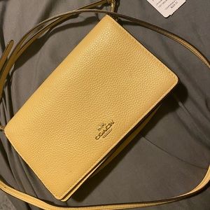 Yellow Coach small envelope crossbody
